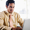 Image of a man using a computer. Image of a man using a computer