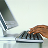 Image of a person using a computer. Image of a person using a computer