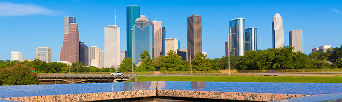 Image of the Houston skyline and memorial pool Image of the Houston skyline and memorial pool