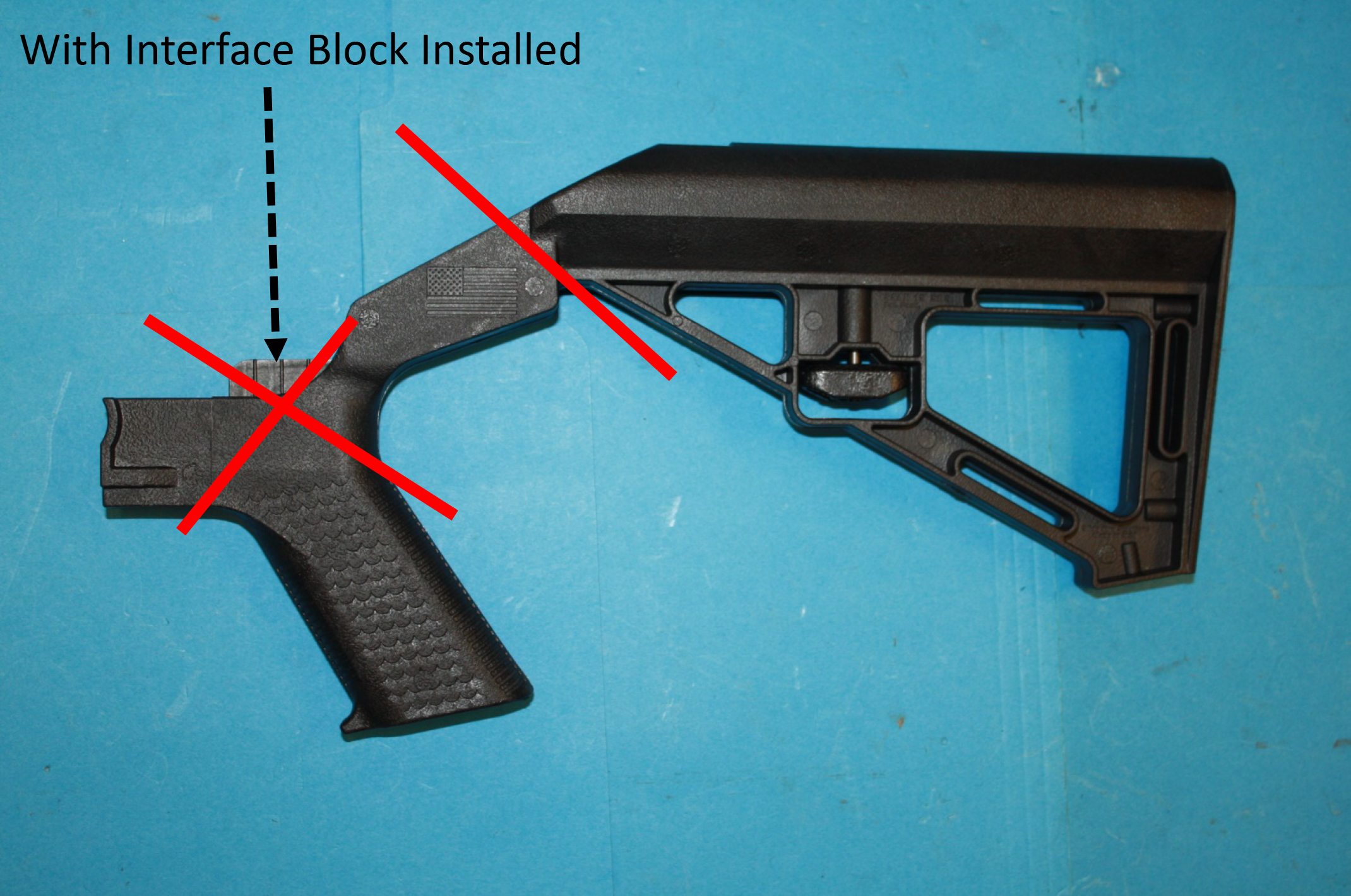 Slide Fire Solutions Bump Stock with interface installed Slide Fire Solutions Bump Stock with interface installed