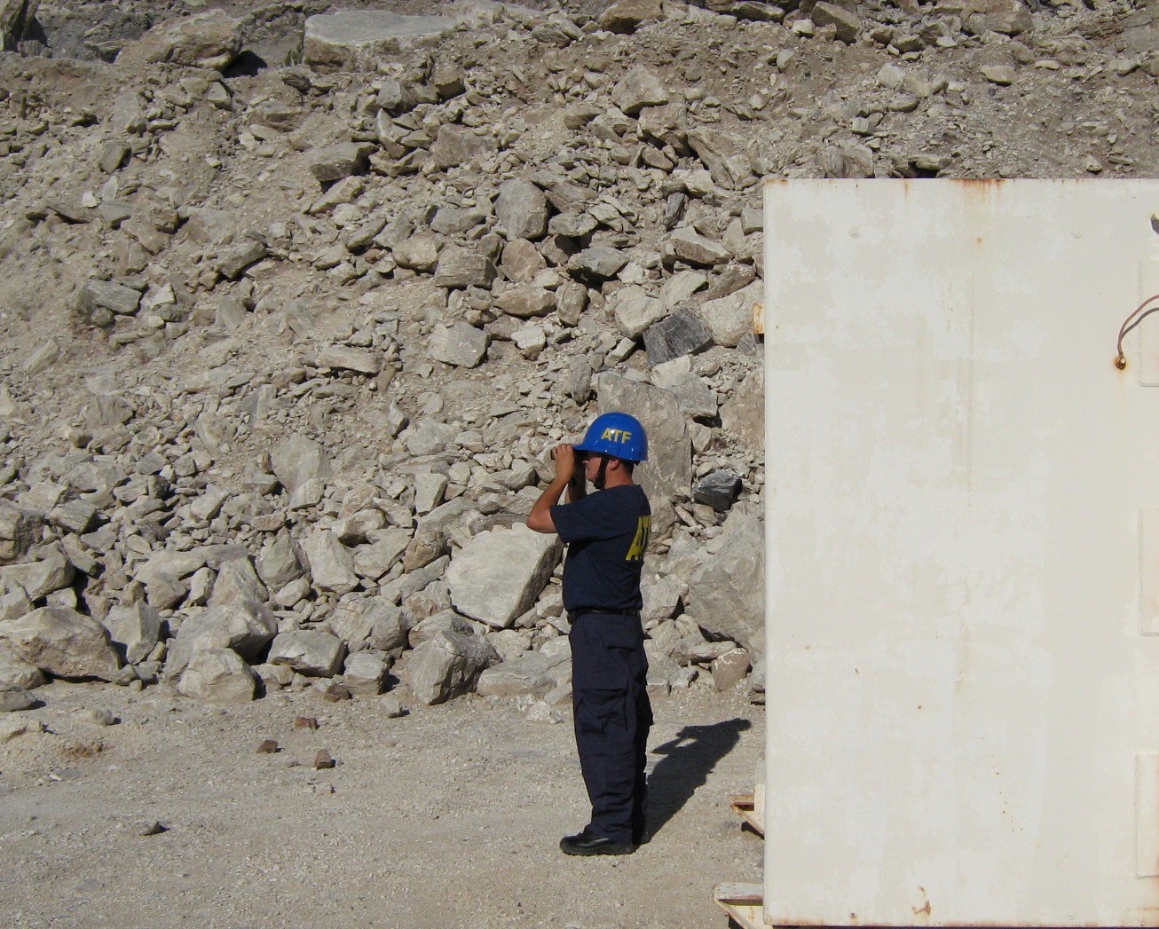 Industry Operations Investigator inspects the explosives activity in a stone quarry