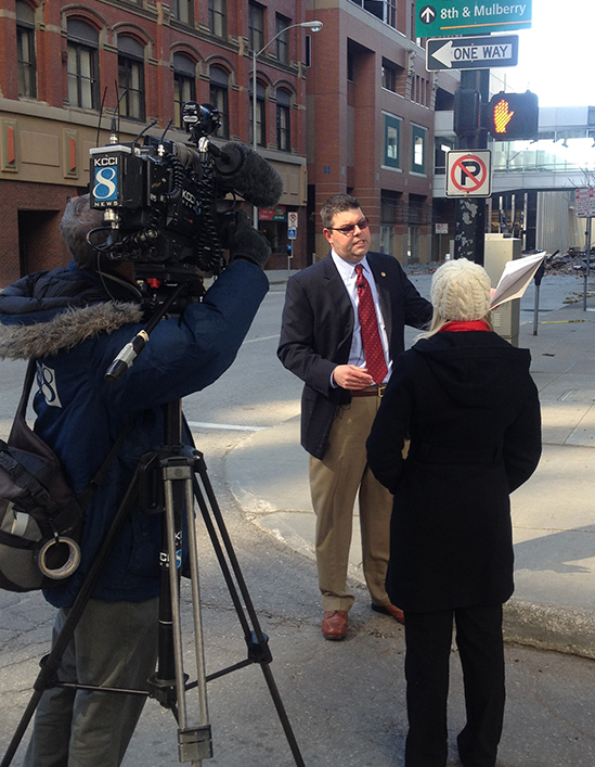 Industry Operation Investigator and Public Information Officer John is interviewed by a local news station on Kansas filed division activities.