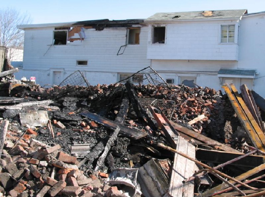 Debris from a house explosion caused by an illegal explosive.