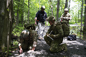 Agents respond to a simulated explosives incident during the annual Raven's Challenge