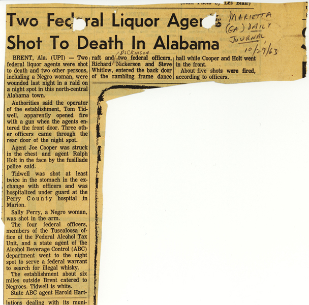 Newspaper article with headline, Two Federal Liquor Agents Shot to Death in Alabama
