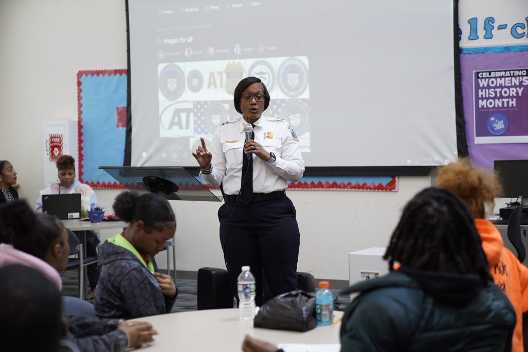 Assistant Chief of the Youth and the Metropolitan Police Department’s (MPD) Family Engagement Bureau (YEFB), Pamela Wheeler-Taylor speaks to the student at Anacostia High School’s Public Leadership Academy about a life as a law enforcement officer.