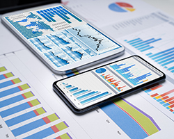 Data charts shown on two mobile devices.