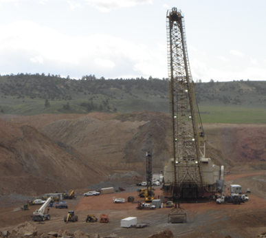 A mine site actively preparing to conduct blasting operations.
