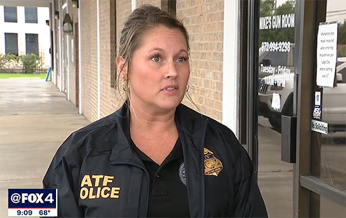Sara Abel in ATF attire being interviewed on camera for a local news station