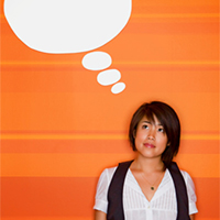 Woman standing next to a question bubble