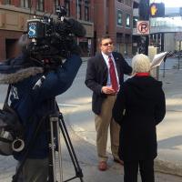 Industry Operation Investigator and Public Information Officer John is interviewed by a local news station on Kansas filed division activities.