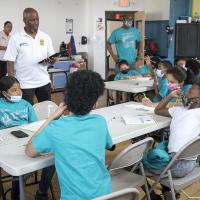 G.R.E.A.T. Program Manager Warren Harding, Officer Stephanie Velasquez and Supervisory Special Agent Kevin Smith teach G.R.E.A.T. summer camp lessons