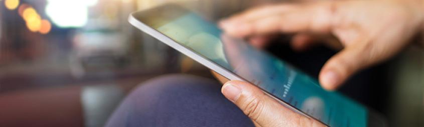 Image of a man with a tablet