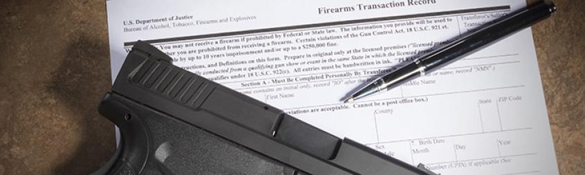 Firearm on top of an ATF form